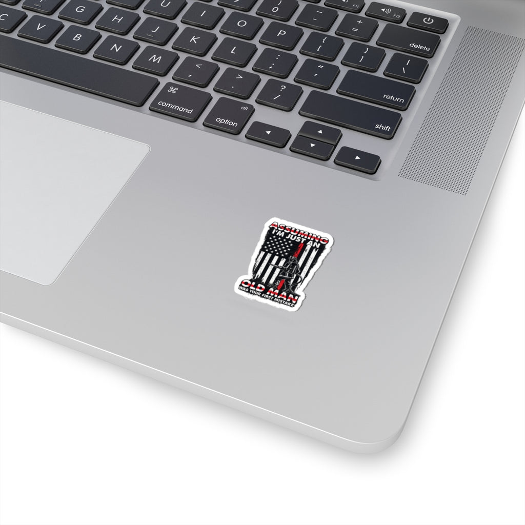 Sticker — “Assuming I’m Just an Old Man” Firefighter American Flag Kiss-Cut Sticker