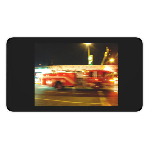 Emergency Response Desk Mat — Blurred Fire Truck Night Scene