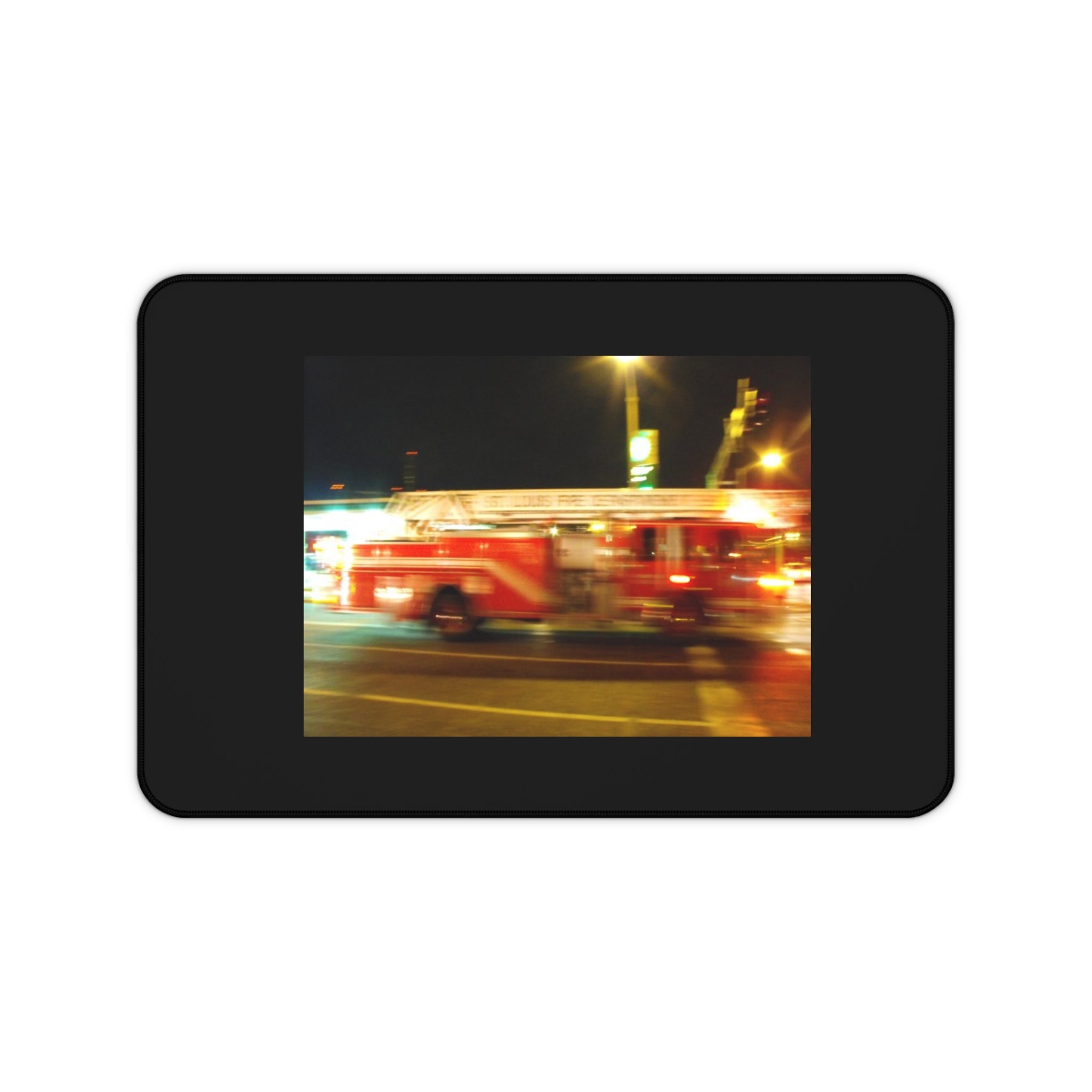 Emergency Response Desk Mat — Blurred Fire Truck Night Scene